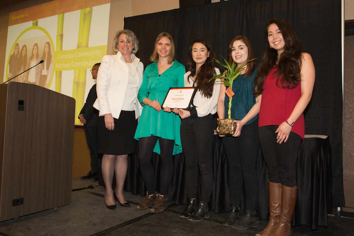 Elizabeth Cannon, president of the University of Calgary, with co-ordinators of the Campus Community Kitchen initiative  as they accept the Sustainability Award for Student Leadership. From left: Julia Weaver, Vivian Duong, Marissa Bennett, Megan Williams.