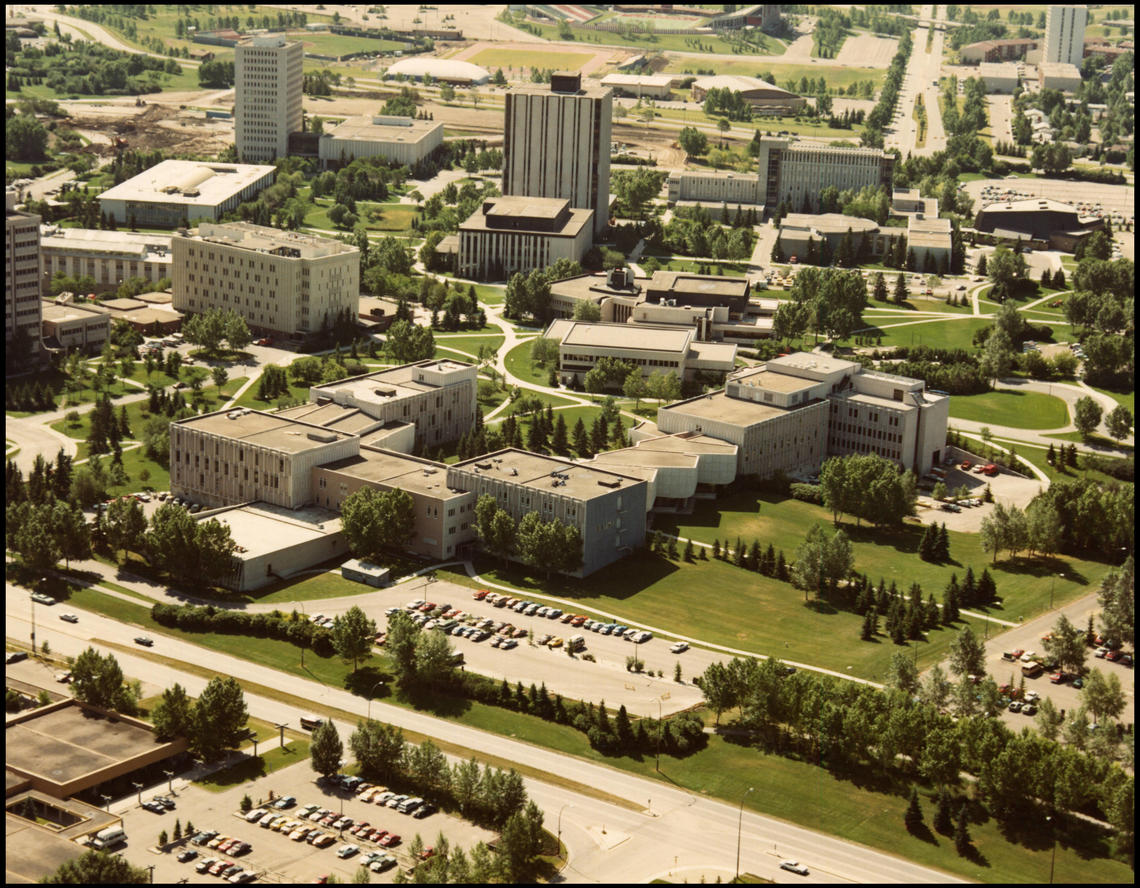 In 1983, an aerial view of the University of Calgary campus featuring Engineering Blocks A to F.