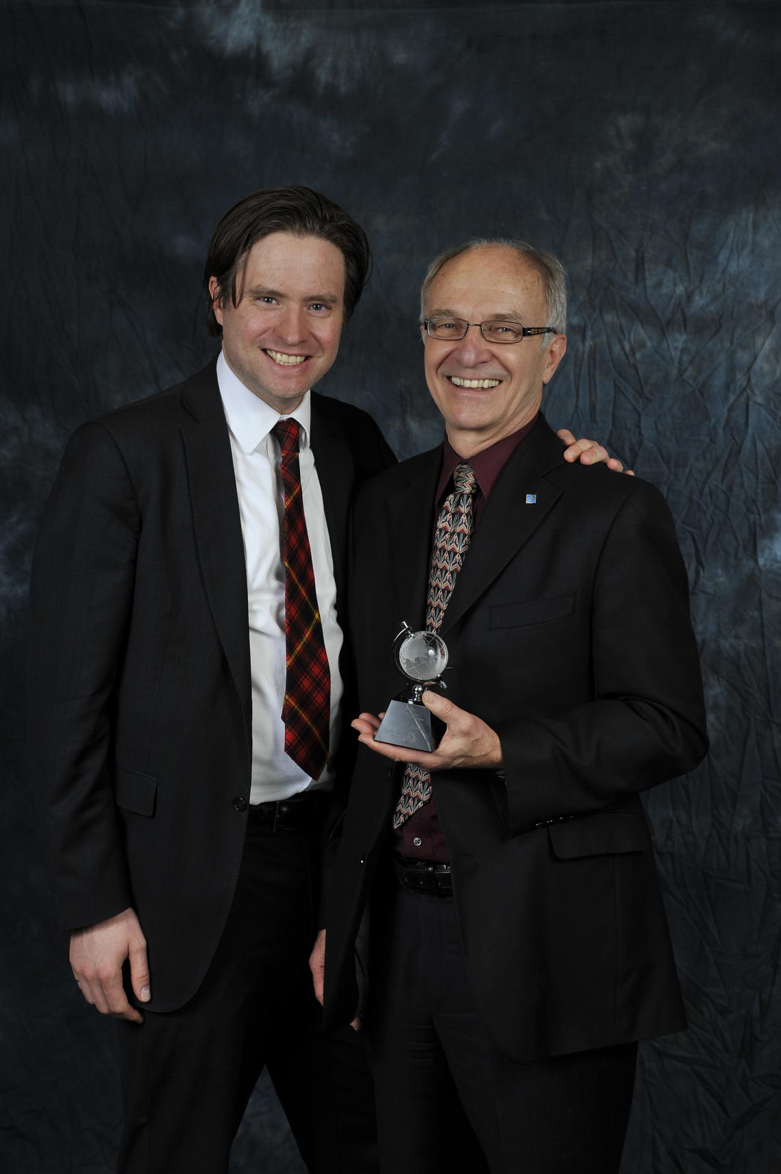 Bill Rosehart, interim dean of the Schulich School of Engineering (left) with Norman Webster, Principal at the Calgary Office of Read Jones Christoffersen Consulting Engineers, recipient of the Distinguished Collaborator Award.