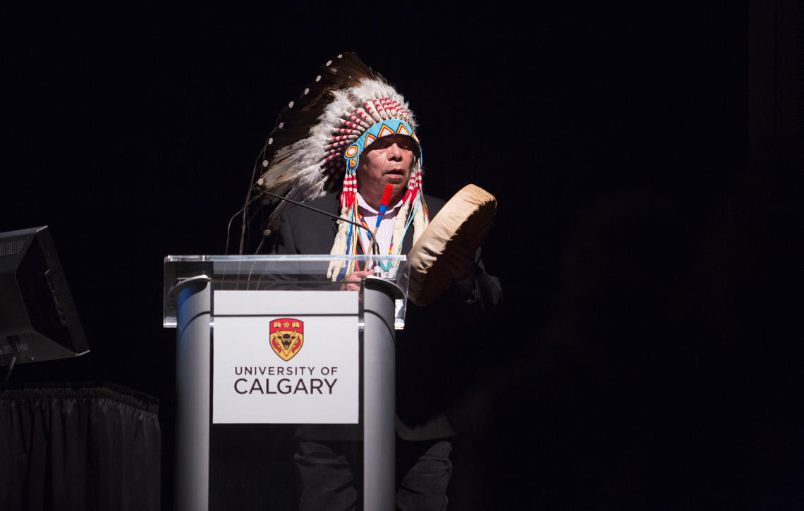 Blackfoot Elder Kelly Good Eagle Sr. performs the opening prayer at the Indigenous Design Thinking symposium.