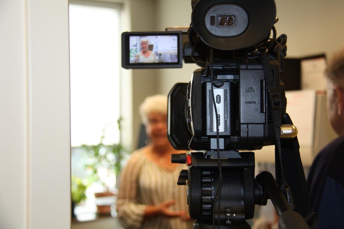 Karin Orsel in front of the TV camera