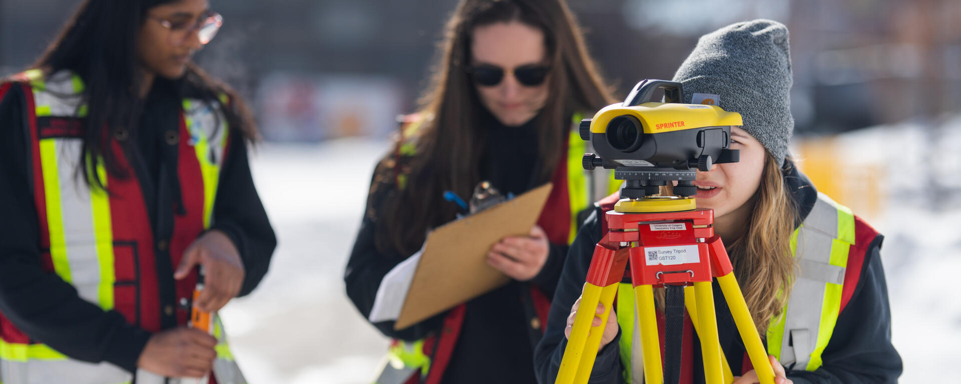 geomatics undergraduate students in a surveying lab