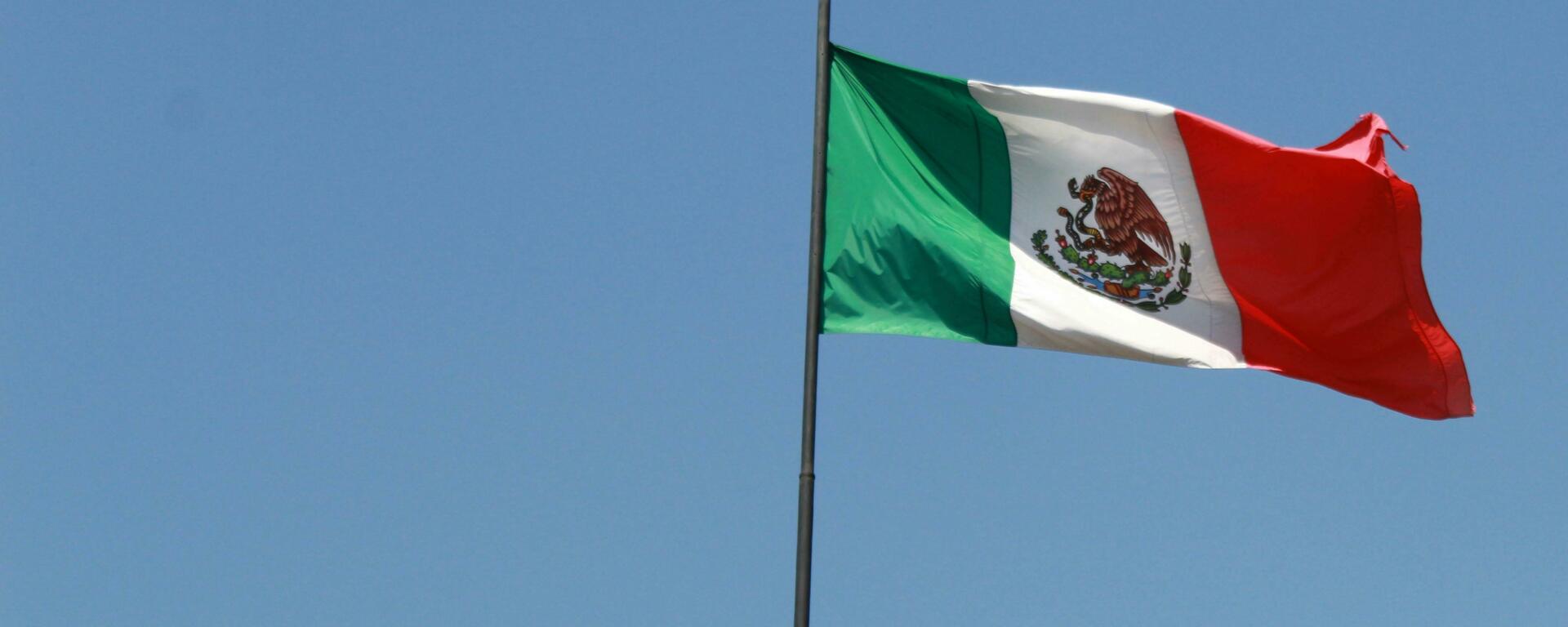 Mexico flag with the blue sky in the background