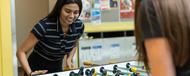 Students playing ping-pong