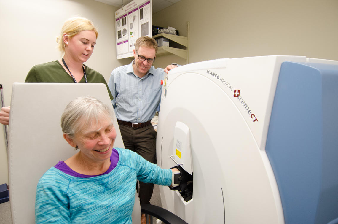 Participant getting their forearm (radius bone) scanned using HR-pQCT at the McCaig Institute