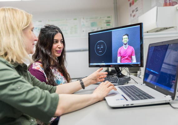 students working in a facial recognition lab