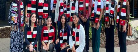 group photo of the students with their Schulich scarfs