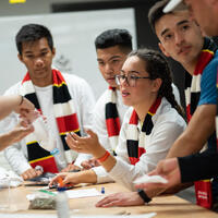 undergraduate students with their scarves