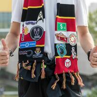 first-year Schulich student wearing his scarf with multiple patches