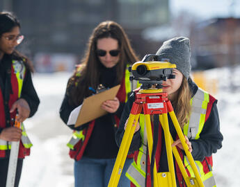 geomatics students surveying outside